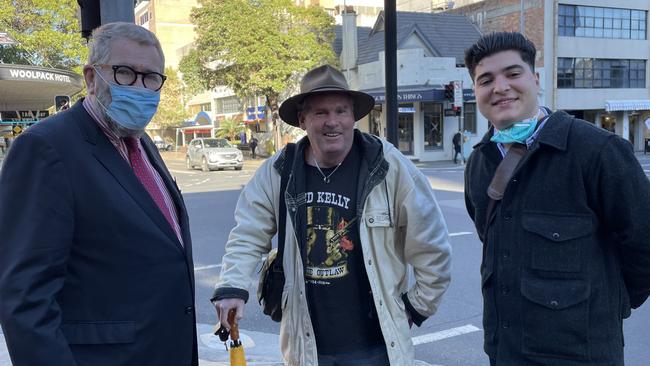 Supporting Drew Pavlou was Raimond Kelly (centre), who had previously faced charges for an anti-CCP protest in which he cracked a whip outside the Chinese consulate. Tony Morris QC (l) and Drew Pavlou (r). Picture: Paul Brescia