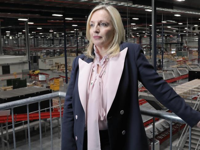 Australia Post chief executive Christine Holgate inspects a new parcels facility. Picture: Mark Cranitch.