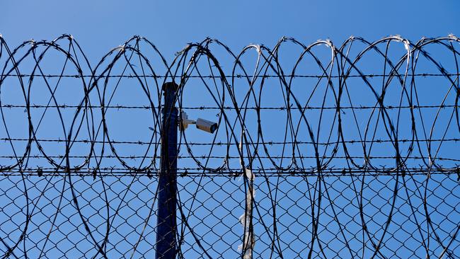 Teenage girls at Don Dale youth detention centre are being forced to shower while under constant surveillance, Parliament has heard