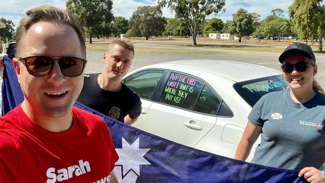 CFMEU lawyer Peter Russell campaigning with Ash the Ambo during the 2022 SA election. Source: Facebook