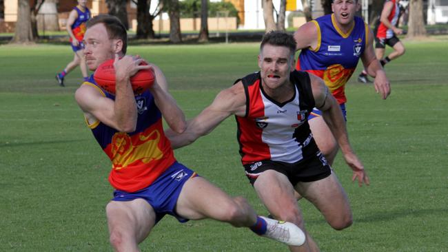 Cardross' Damien Ford marks in front of Bambil's Brendan Guy. Picture: Glenn Milne