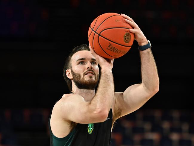 Sean Macdonald warms up before a match against Cairns Taipans in February. Picture: Emily Barker/Getty Images.