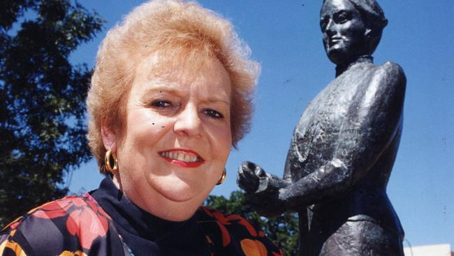 Mary Beasley, with the Light Square statue of suffragist Catherine Helen Spence in Adelaide. Picture: File