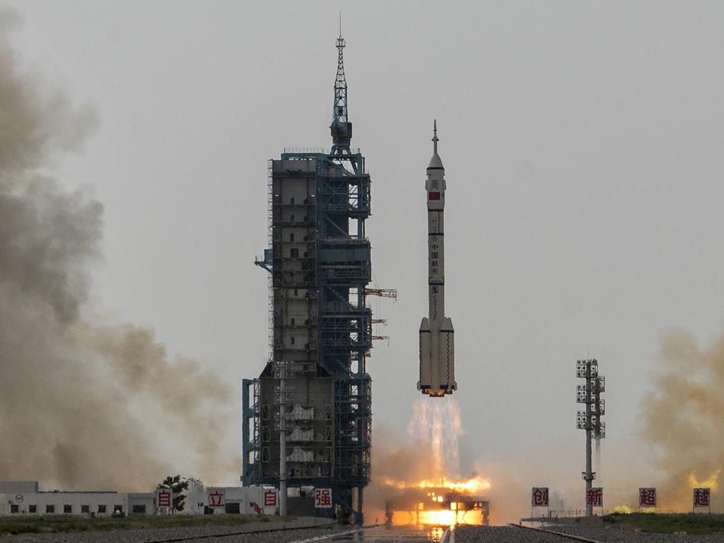 JIUQUAN, CHINA - MAY 30: The Shenzhou-16 spacecraft onboard the Long March-2F rocket of China Manned Space Agency takes off at the Jiuquan Satellite Launch Center on May 30, 2023 in Jiuquan, China. The three astronaut crew of the Shenzhou-16 spacecraft will be carried to China's new Tiangong Space Station and will replace a similar crew that have been at the station for the last six months.(Photo by Kevin Frayer/Getty Images)