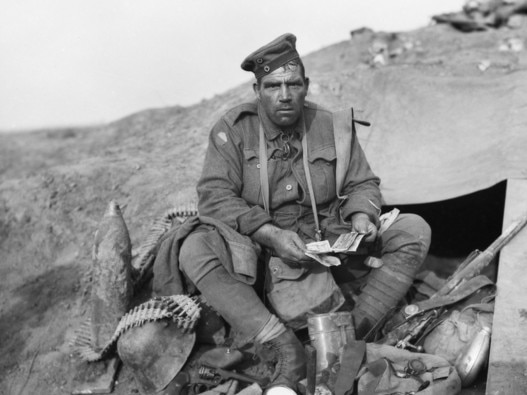 "A Souvenir King!" 2296 Private John "Barney" Hines, A Company, 45th Battalion, with his trophies (souvenirs) obtained on the morning of the advance of the 4th and 13th Brigades at Polygon Wood, in the Ypres Sector, during the Third Battle of Ypres. Taken 27/9/17. Source: Australian War Memorial.