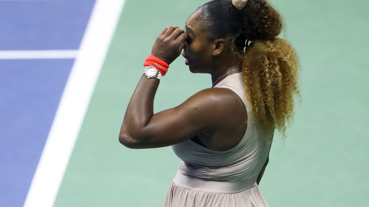 Serena Williams throws her racket after losing the second set tiebreak to  Victoria Azarenka of Belarus in the Woman's Final in Arthur Ashe Stadium at  the U.S. Open Tennis Championships at the