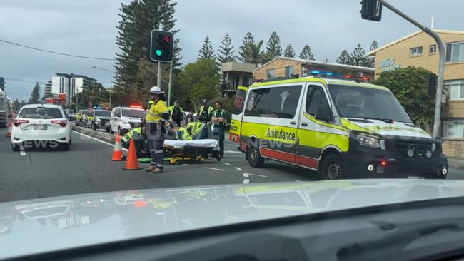 Paramedics attending to a man after a road rage incident left him with serious injuries. Picture: Seven News