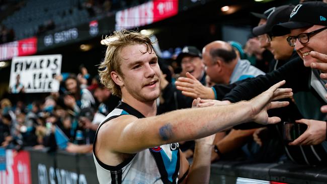 Jason Horne-Francis celebrates with Port fans. Picture: Dylan Burns