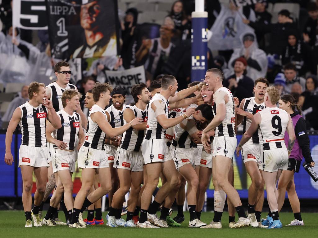 The Magpies celebrate Ed Allan‘s first career goal. Picture: Darrian Traynor/Getty Images