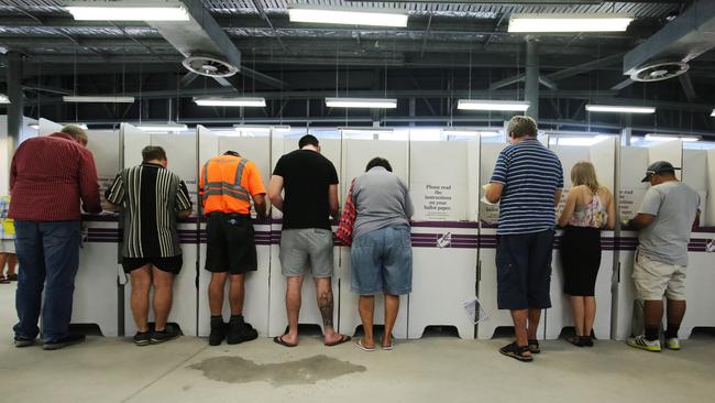 Cairns residents cast their vote in the 2016 Federal election at the pre polling booths set up at DFO shopping centre in Westcourt. General generic, stock photo of people voting. BRENDAN RADKE