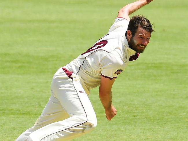 Michael Neser of Queensland bowls during the Marsh Sheffield Shield match between the Queensland Bulls and the Tasmanian Tigers at The Gabba in Brisbane, Friday, February 14, 2020. (AAP Image/Albert Perez) NO ARCHIVING, EDITORIAL USE ONLY, IMAGES TO BE USED FOR NEWS REPORTING PURPOSES ONLY, NO COMMERCIAL USE WHATSOEVER, NO USE IN BOOKS WITHOUT PRIOR WRITTEN CONSENT FROM AAP