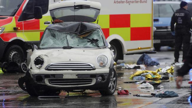 MUNICH, GERMANY - FEBRUARY 13: Police and emergency services operate near a damaged car that apparently drove into demonstrators marching in the city center on February 13, 2025 in Munich, Germany. According to initial reports 20 people are injured. Police have detainedÃÂ theÃÂ driver. The incident comes a day before the start of the Munich Security Conference, which draws scores of foreign government officials to the city. (Photo by Johannes Simon/Getty Images)