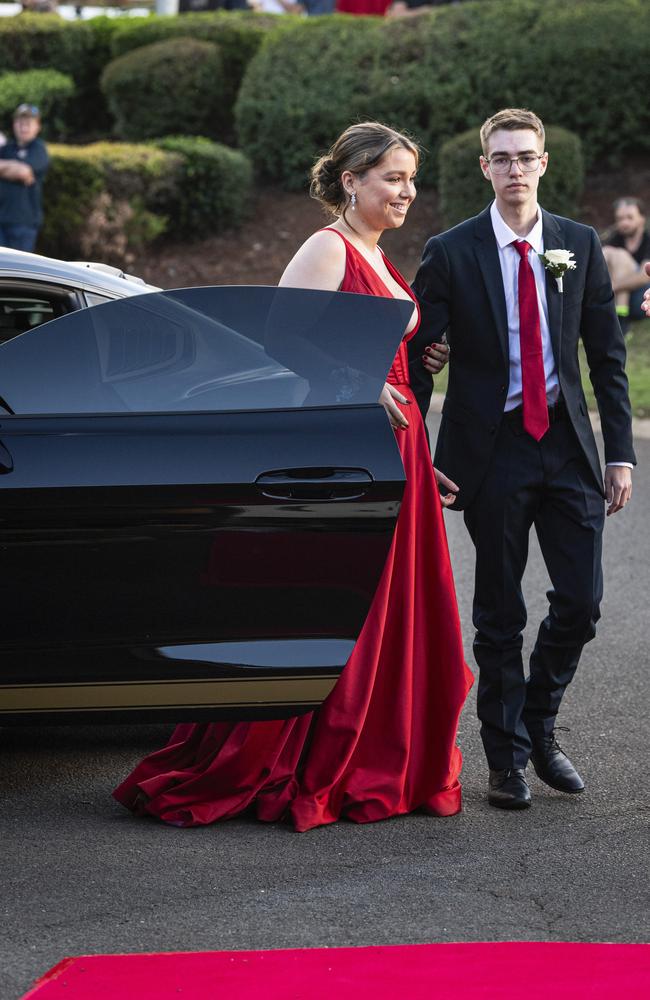 Graduate Lucy Carpenter and partner Brannon Clerihew arrive at Mary MacKillop Catholic College formal at Highfields Cultural Centre, Thursday, November 14, 2024. Picture: Kevin Farmer