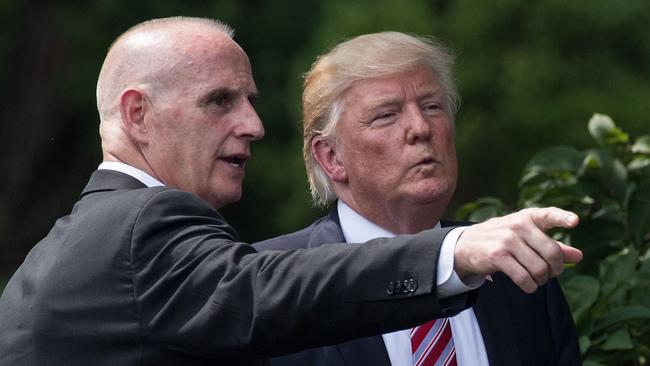 (FILES) In this file photo taken on June 12, 2017, US President Donald Trump listens to Director of Oval Office Operations Keith Schiller at the White House in Washington, DC. Trump's former doctor, Harold Bornstein, said on May 1, 2018, that a bodyguard visited his Park Avenue office on February 3, 2017, and confiscated the president's medical records. He identified Schiller as the bodyguard, who until September 2017 worked at the White House as operations director. / AFP PHOTO / NICHOLAS KAMM