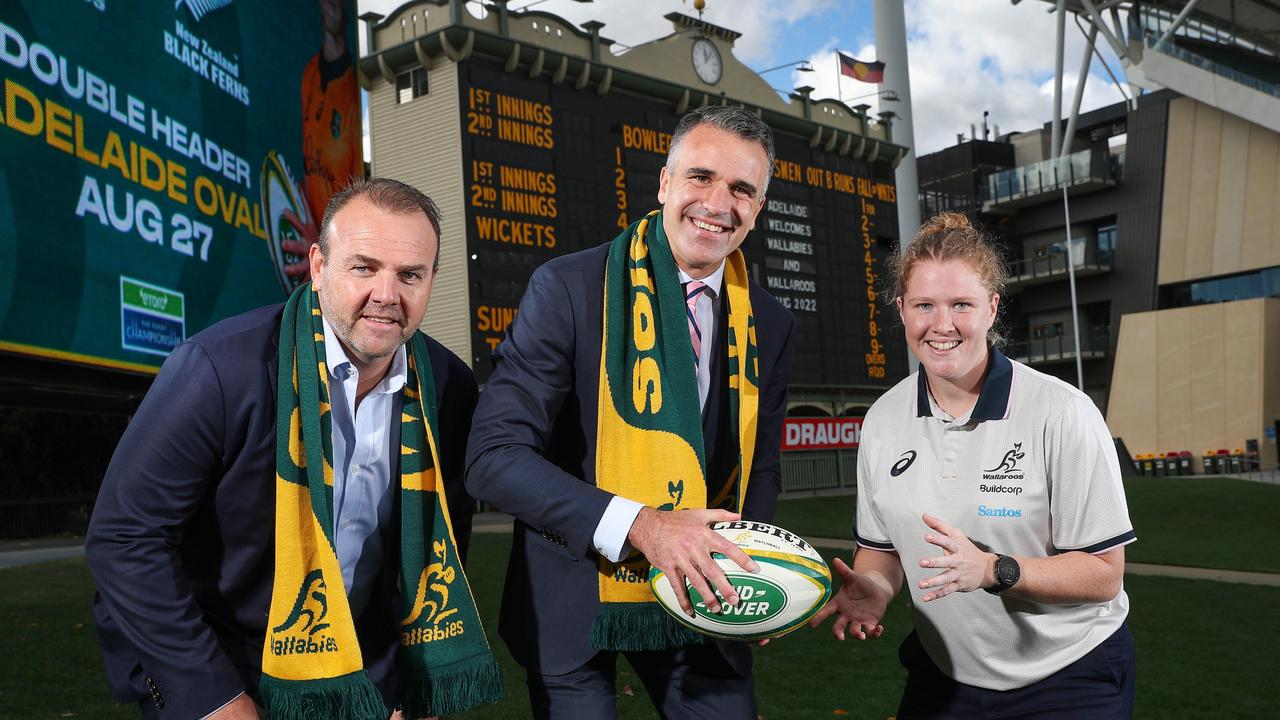 Rugby AU CEO Andy Marinos, South Australian Premier Peter Malinauskas and Classic Wallaroo Averyl Mitchell at Adelaide Oval.