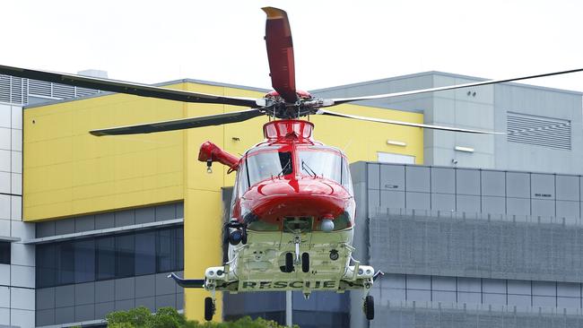 A helicopter departs the Cairns Hospital helipad after delivering a patient in a serious condition. Picture: Brendan Radke