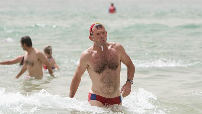 Tony Abbott has volunteered at beaches for two decades. 