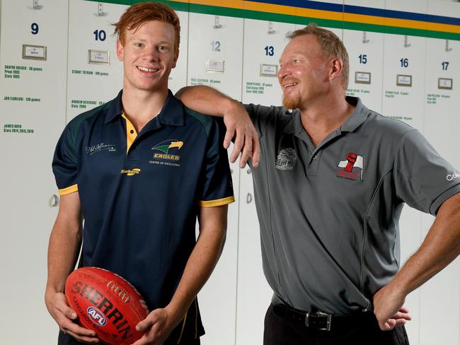 21/11/17 - Former Crows player Wayne Weidemann's son Jake is a chance to be selected by an AFL at the national draft on Friday. Pictured with his dad at Woodville Oval. Photo Naomi Jellicoe