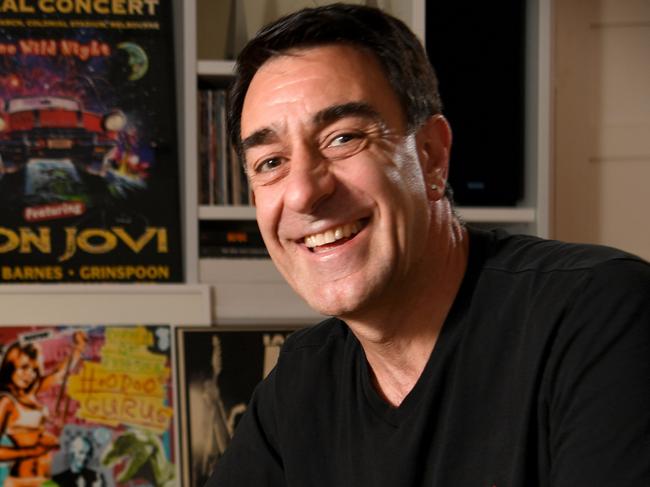 AUSTRALIA DAY HONORS. Mick Mazzone, music manager and charity man, OAM. He is pictured with some of his music paraphernalia and a guitar signed by George Young (from the Easybeats, Vanda and Young, Love is in the Air song writer and ACDC Producer and brother). Picture: Tricia Watkinson