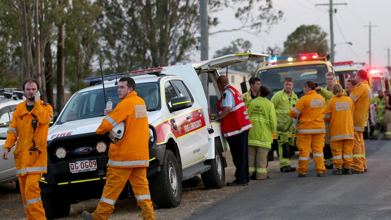 Emergency services workers in the Lockyer Valley yesterday. Picture: Steve Pohlner