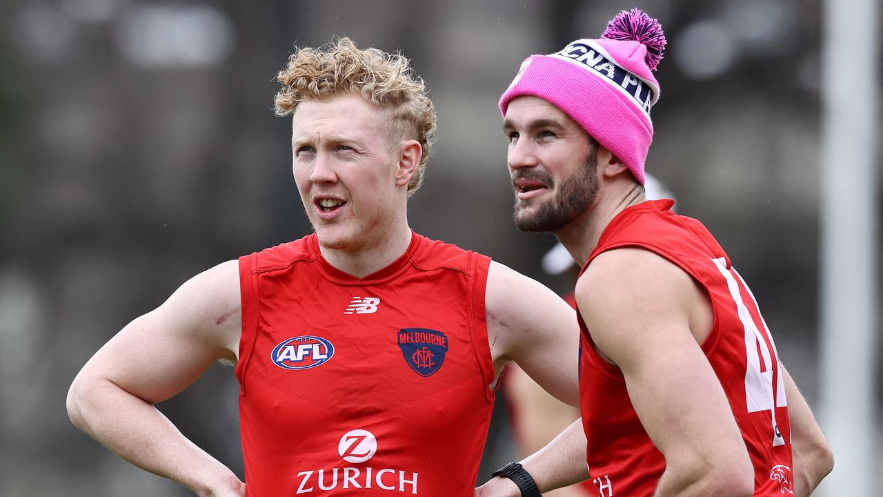 Melbourne training at GoschÃ&#149;s Paddock. 25/07/2021. Clayton Oliver and Joel Smith of the Demons at training today . Pic: Michael Klein