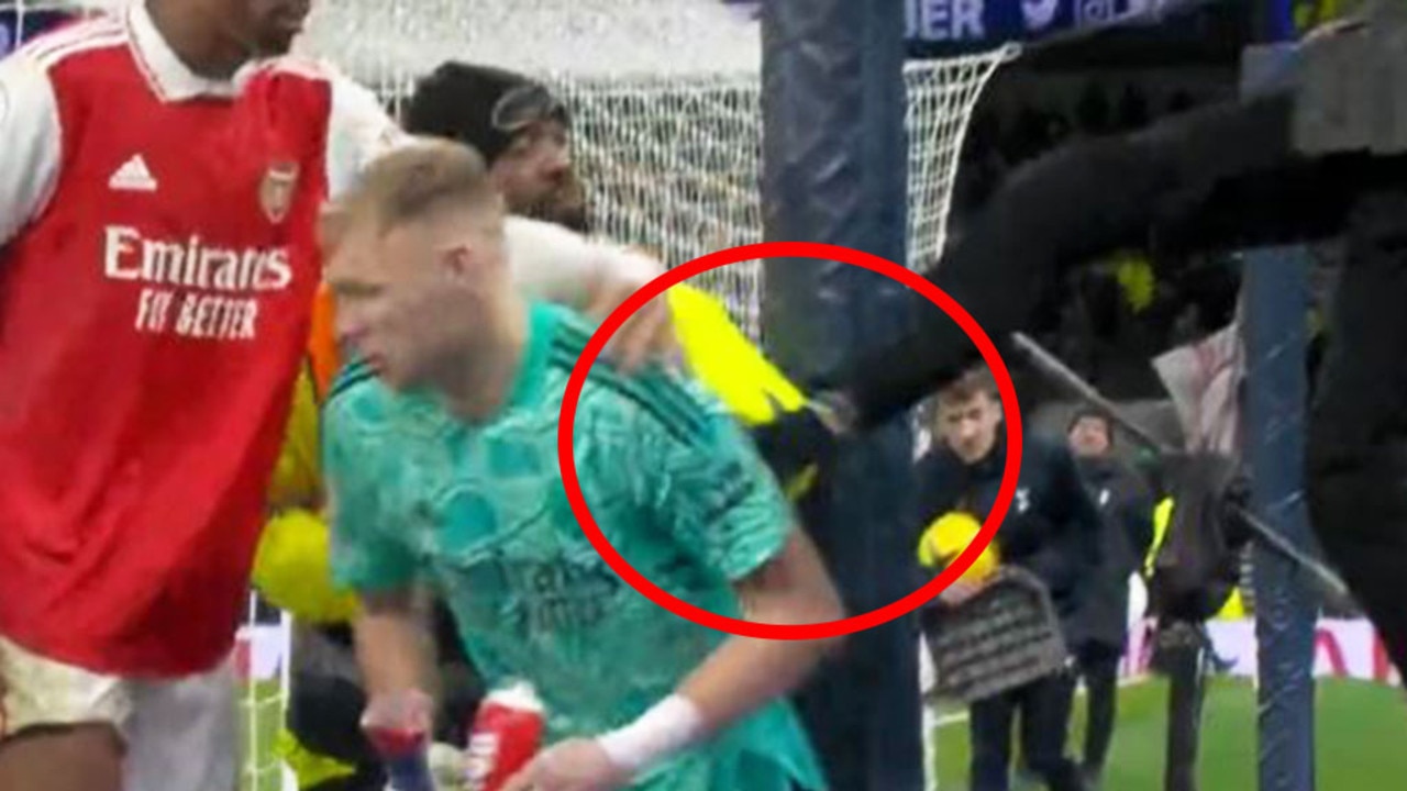 Arsenal goalkeeper Aaron Ramsdale appears to be kicked by