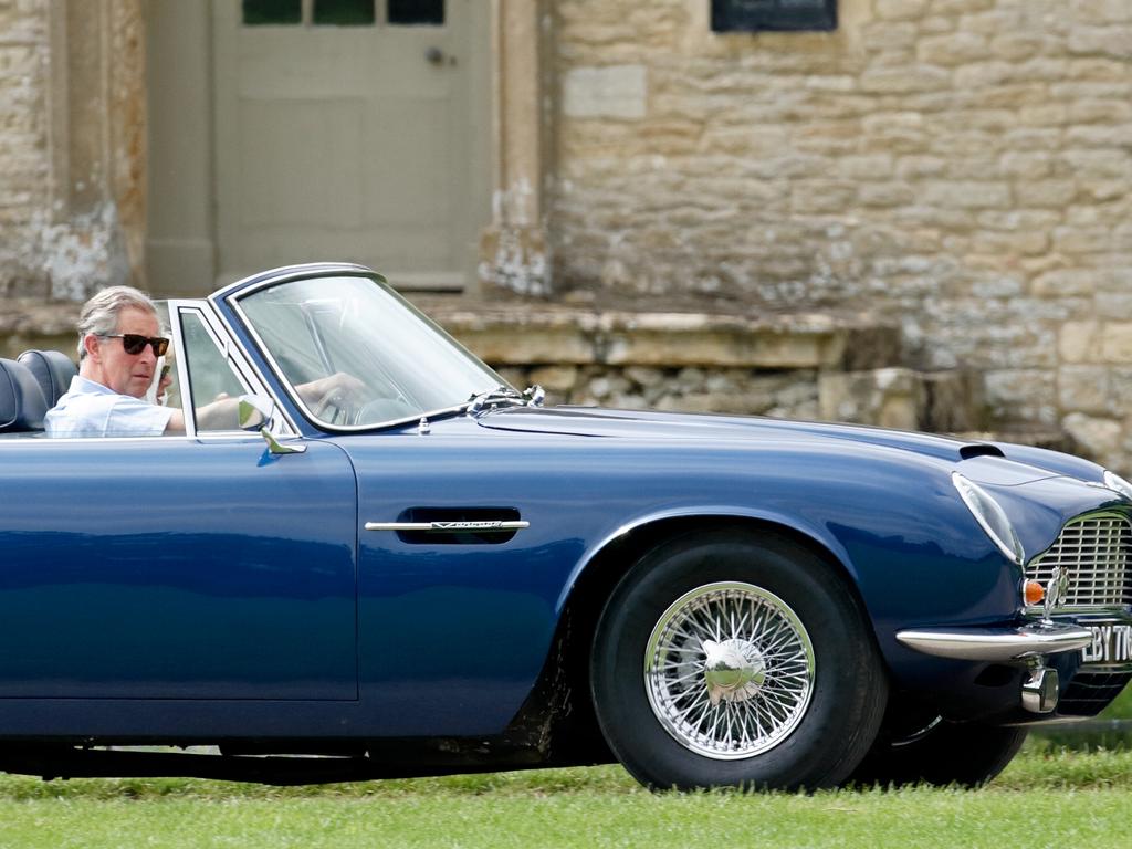 Charles pictured in 2005 in his 1969 Aston Martin. He famously had the car converted to run on bioethanol. Picture: Max Mumby/Indigo/Getty Images