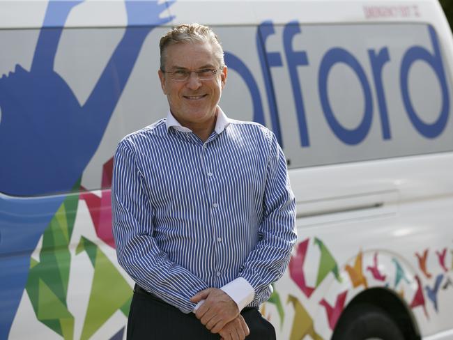 Australian Foundation For Disability CEO Steven Herald in one of the 200 vehicles in his fleet which are being tied up by Sydney's congestion. Photo: Tim Pascoe