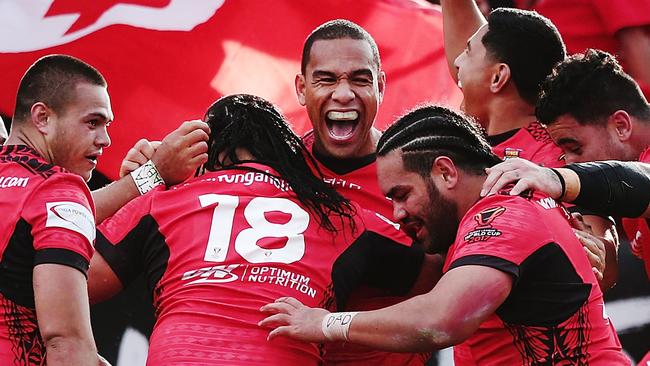 Tonga celebrate a try during the 2017 Rugby League World Cup match between the New Zealand Kiwis and Tonga at Waikato Stadium.