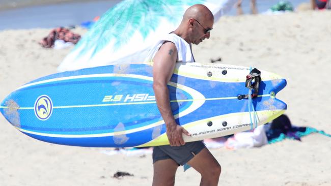 Moses Obeid, the son of jailed former NSW Labor politician Eddie Obeid, enjoys the beach at Port Macquarie.