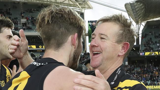 Glenelg coach Mark Stone hugs Jonty Scharenberg after the win. Picture SARAH REED