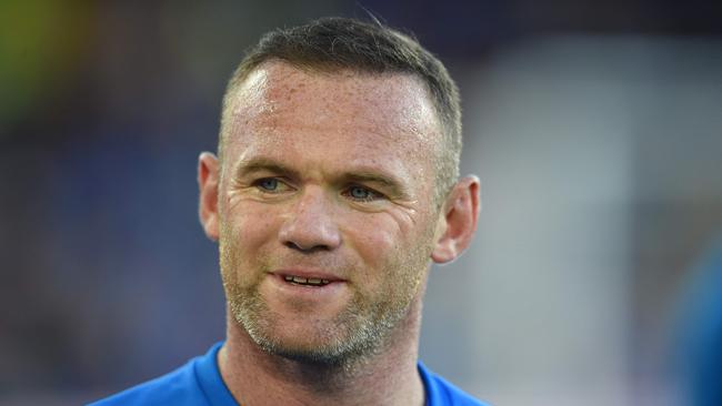 Wayne Rooney was arrested and charged by British police.