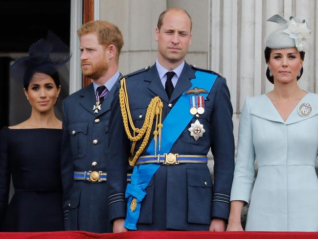 The foursome appear together on the balcony of Buckingham Palace before their relationship fell apart. Picture: AFP.