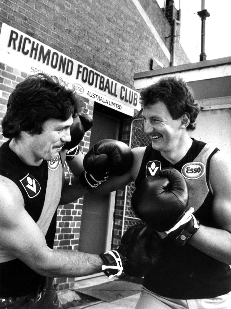 Brian Taylor (left) alongside former Richmond full-forward Michael Roach (right)