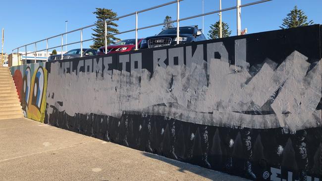 A controversial mural on the Bondi graffiti wall has been defaced overnight.