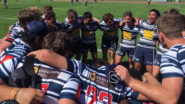 Brothers celebrate a round 1 win.