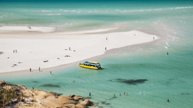 Whitehaven Beach is a popular holiday destination in Queensland. Photo: Getty Images