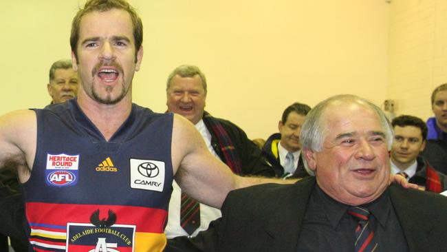 Mark Ricciuto with father Murray after his 300th game in 2006. Picture: File