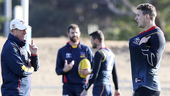 Crows coach Don Pyke talks to forward Josh Jenkins in August. Picture: SARAH REED