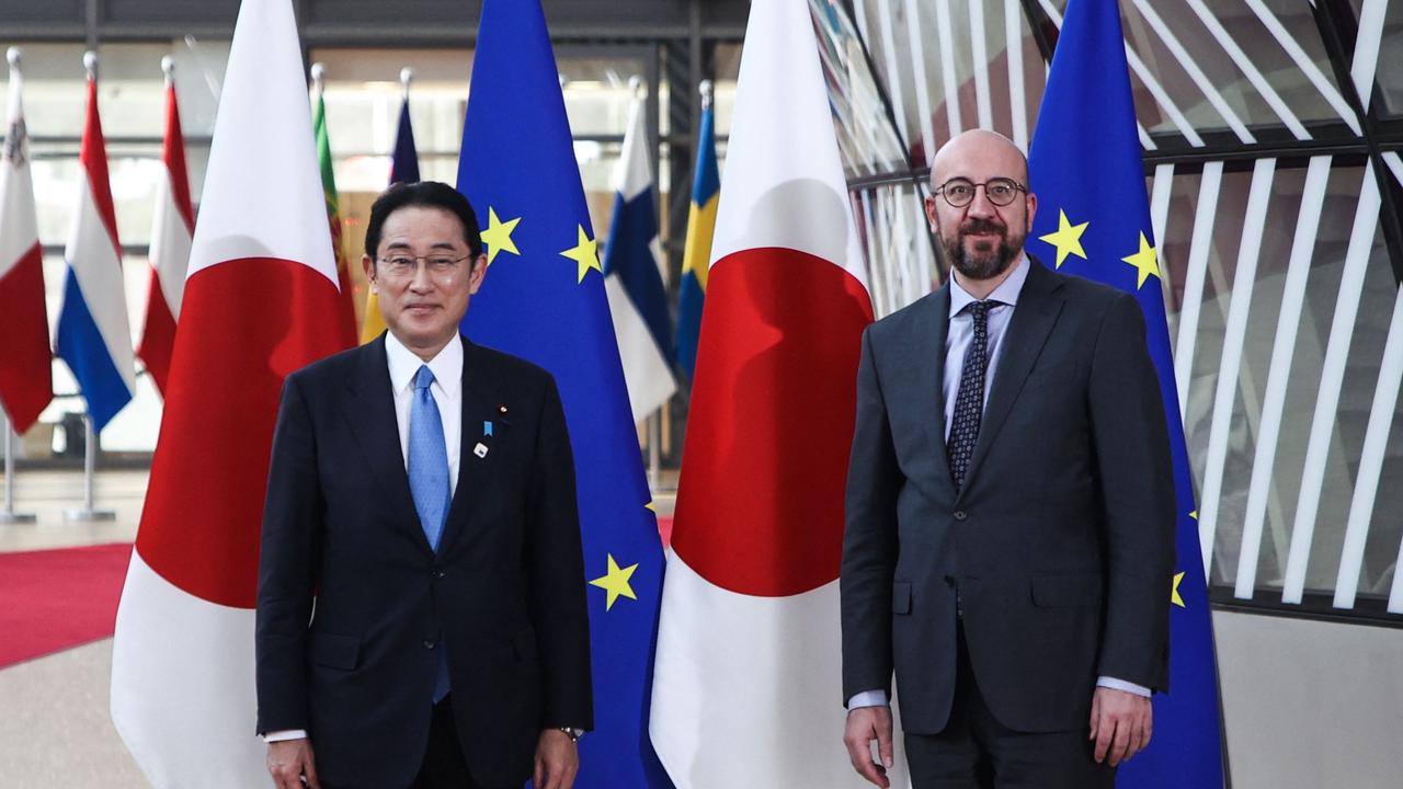 Japan's Prime Minister Fumio Kishida (L) and President of the European Council Charles Michel as they arrive for the extraordinary NATO summit. Picture: Aris Oikonomou / AFP