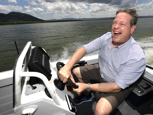 Queensland LNP leader Tim Nicholls drives a boat on the Peter Faust Dam in Proserpine yesterday. Picture: Dave Hunt/AAP