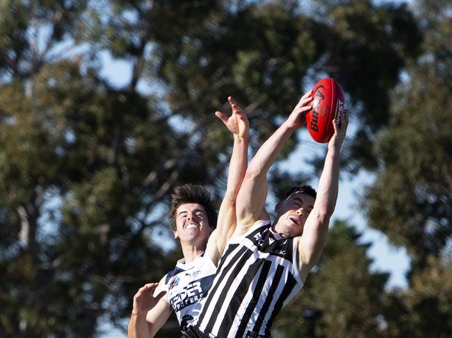 Dylan Aldridge takes a huge grab for Port Adelaide in the SANFL. Picture: Emma Brasier