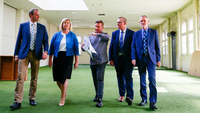 Government and council are encouraging people to develop unused inner city spaces into living spaces in Launceston. From left, ministers Michael Ferguson and Bridget Archer, developer Steve Simeoni, Chamber of Commerce CEO Neil Grose and Launceston mayor Albert van Zetten. Picture: PATRICK GEE