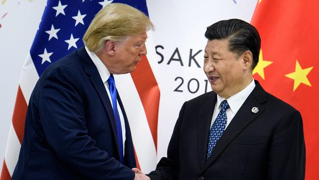 China's President Xi Jinping with US President Donald Trump before a bilateral meeting on the sidelines of the G20 Summit in Osaka. Picture: Brendan Smialowski/AFP