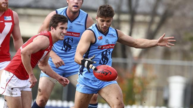 Sturt’s James Battersby gets his kick away against North Adelaide on Saturday. Picture: Sarah Reed