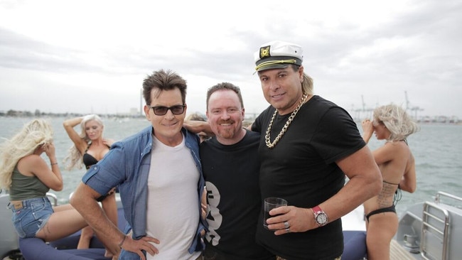 Director Shannon Young, Charlie Sheen and Warwick Capper on set of the Ultra Tune ad.