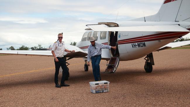 Federal MP for Kennedy Bob Katter visited Doomadgee on Friday with KAP leader Robbie Katter to bring essential supplies to the flood-affected community. Picture: supplied KAP