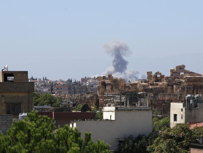 Smoke billows after an Israeli strike on Baalbek, in Lebanon's Bekaa valley.