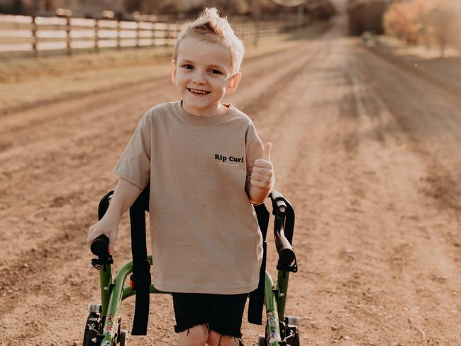 Jack Irvine, who will undergo surgery which is hoped will help him walk without a frame. Picture: Sticks And Stones Photography