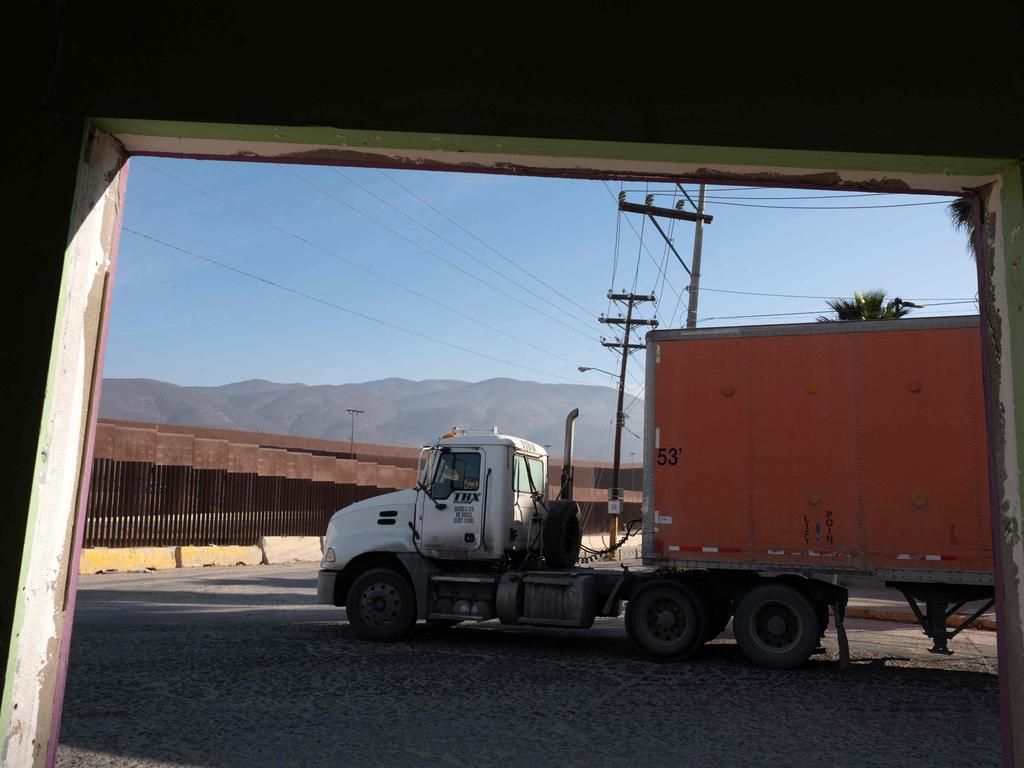 Mexico's economy suffered its first contraction in three years in the fourth quarter of 2024, official figures showed on January 30, as the country braces for US President Donald Trump's threatened tariffs. (Photo by Guillermo Arias / AFP)